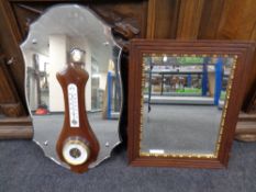 A mid 20th century frameless mirror mounted on a board together with a further framed bevel edged