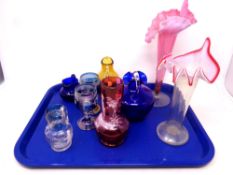 A tray containing ten pieces of antique and later glassware to include fluted vases,