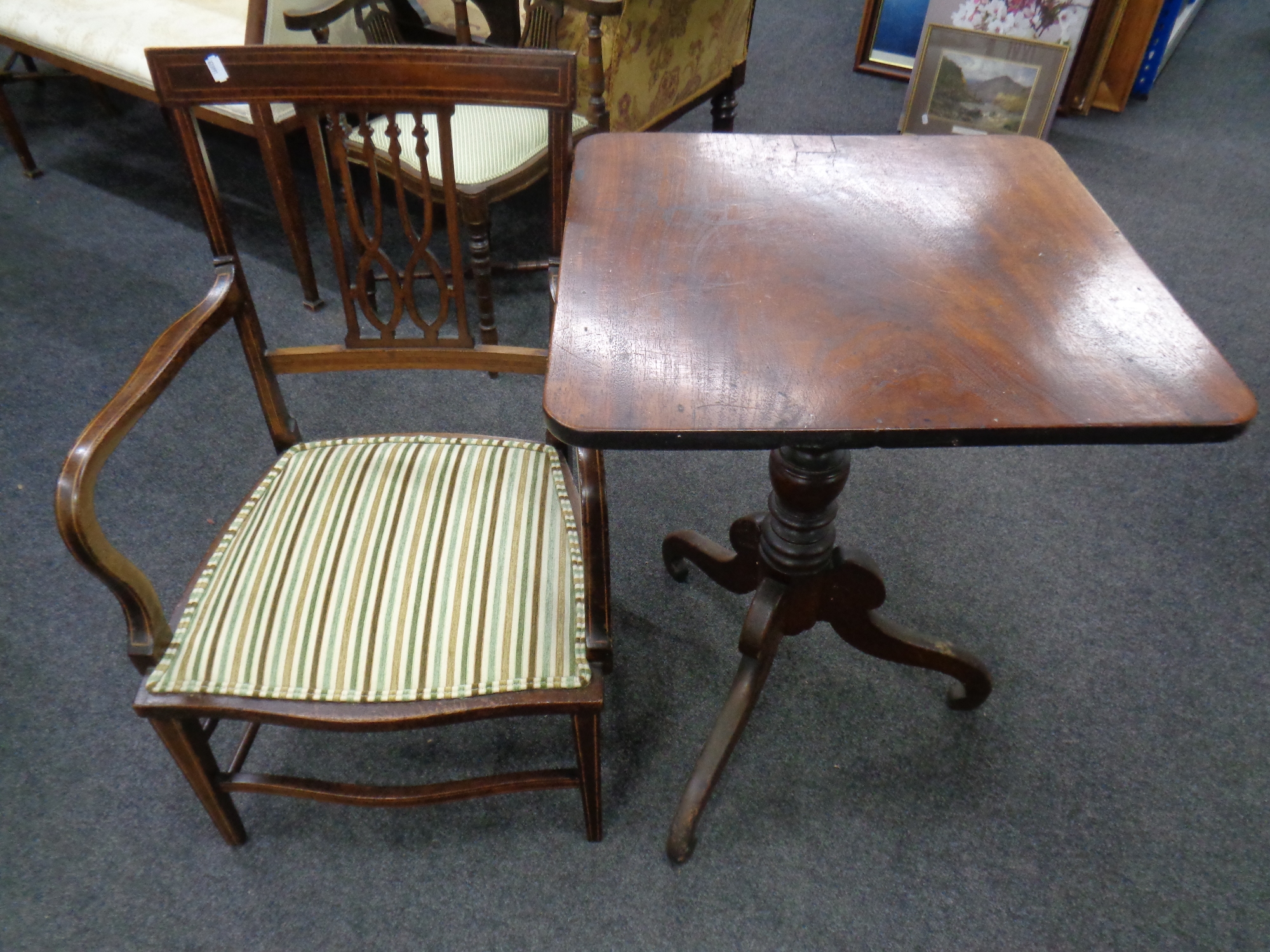 A 19th century inlaid mahogany armchair together with a further 19th century mahogany tile topped