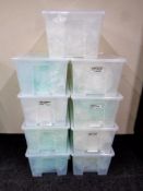 Nine plastic storage boxes with lids (9)