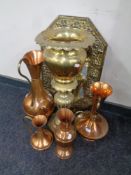 An octagonal brass framed embossed mirror together with a brass planter and four copper and brass