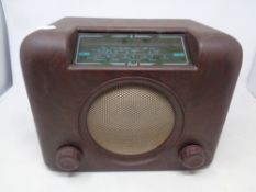 An early 20th century Bush Bakelite cased valve radio.