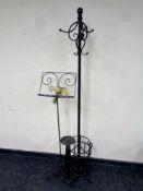 A contemporary metal patterned coat stand with stick stand base together with a music stand and a