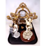 A three-piece Juliana clock garniture together with a Leonardo collection figure, Bride and Groom,