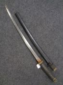 A WWII Japanese NCO's katana sword in scabbard