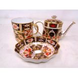 A Royal Crown Derby Imari patterned miniature teapot (height 7.5 cm), a coffee cup (height 5.