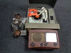 A mid 20th century Defiant table top record player together with a vintage valve radio and a set of