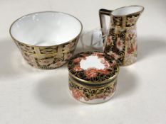 A Royal Crown Derby Imari pattern miniature sugar bowl and cream jug set, bowl height 4 cm,