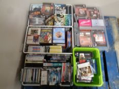 Five baskets and crates containing a large quantity of DVD's, movies,