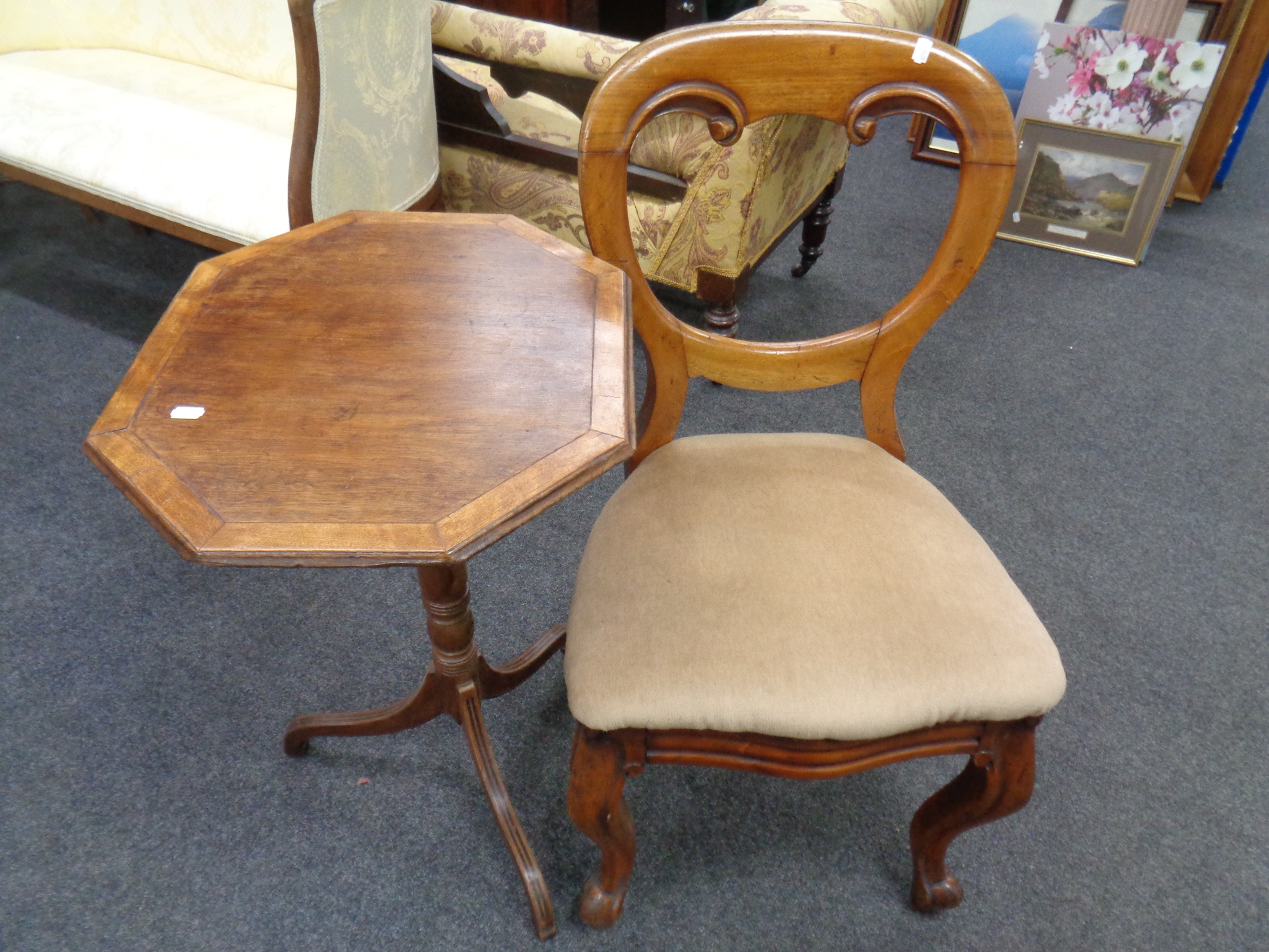 A Victorian mahogany balloon back chair together with an octagonal pedestal wine table