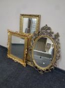 A gilt framed hall mirror together with two further ornate gilt framed mirrors