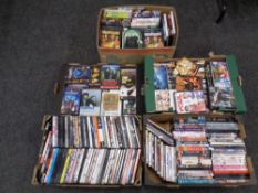 Five boxes of various DVDs