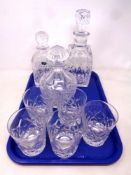 A tray containing three lead crystal decanters to include Torrington together with a set of five
