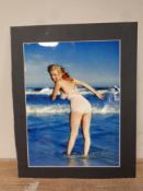 A colour photograph of Marilyn Monroe on Tobay beach 1949,