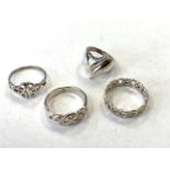 Four solid Silver rings