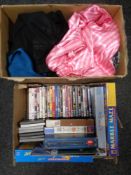 Two boxes of assorted lady's clothing, board games, jigsaws,