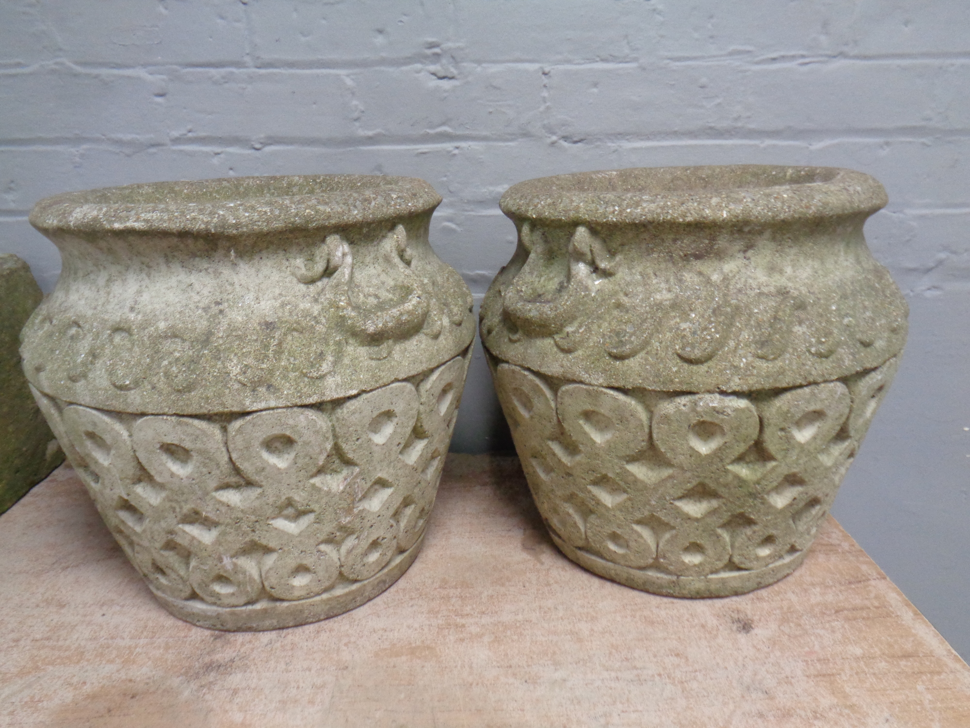 A pair of Cotswold Studios classical concrete planters