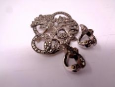 A silver Marcasite brooch together with a pair of earrings.