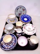 A tray containing antique ceramics to include 19th century tea cups with saucers, lustre milk jug,