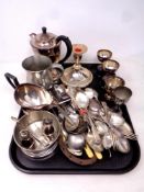 A tray of a large quantity of assorted plated wares to include cutlery, teapot, candlestick,