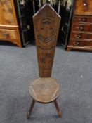 A carved beech spinning chair