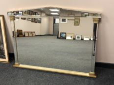 A frameless gilt classical style overmantel mirror,