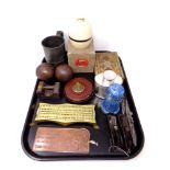 A tray of miscellany to include two vintage finger planes, leather cased tape measures,