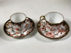 A Royal Crown Derby Imari Scissors pattern coffee cup and saucer set,