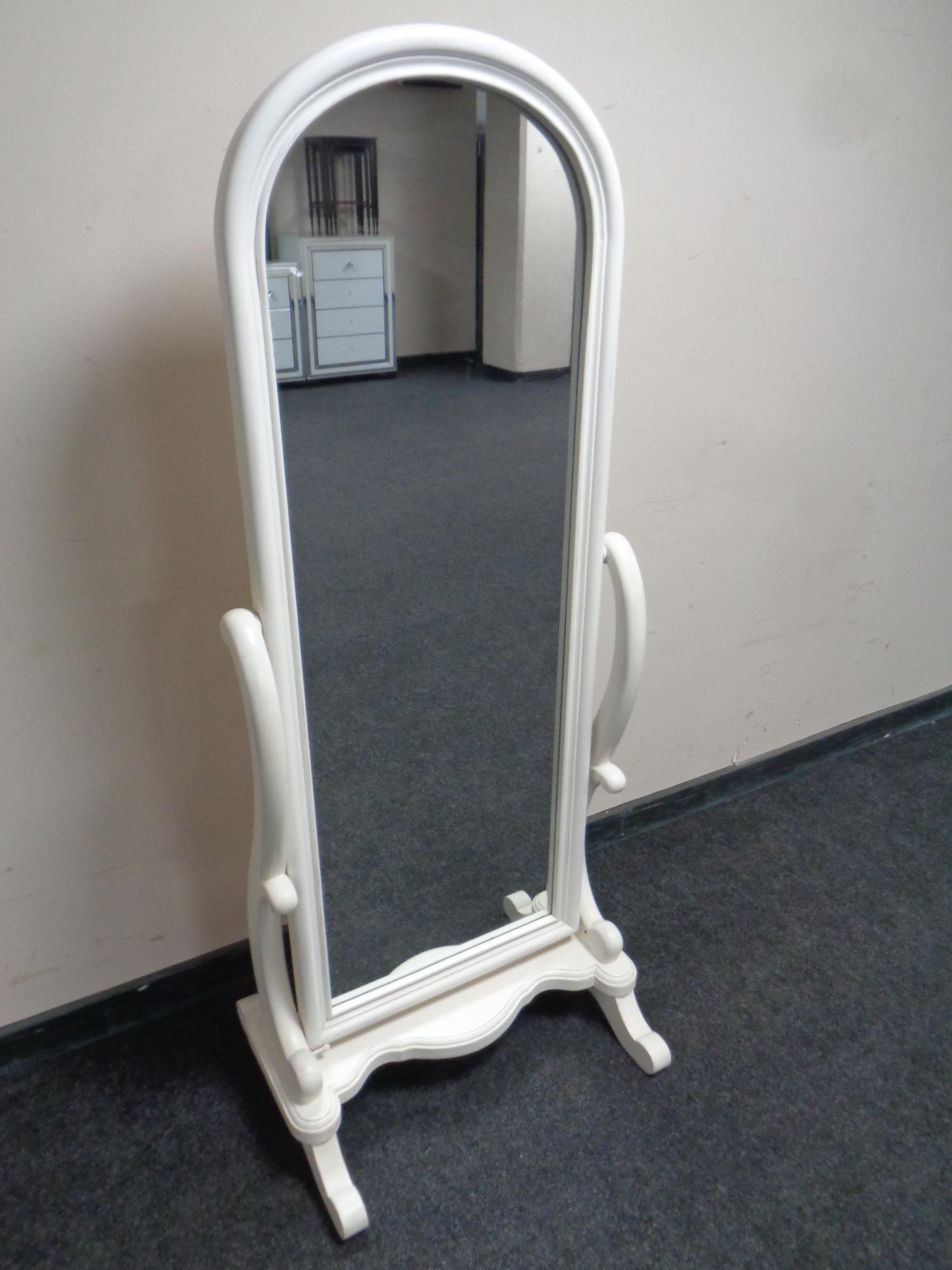 A white painted cheval dressing mirror