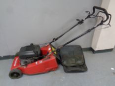 A Mountfield empress power drive petrol lawn mower with grass box