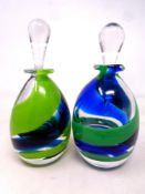 Two Jane Charles art glass bottles with stoppers signed to base