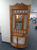 An Edwardian pine mirrored hall stand