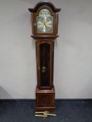 A Tempus Fugit longcase clock with pendulum and weights