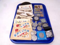 A tray containing a collection of postcards to include France 1940 souvenir, needlework's,