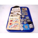 A tray containing a collection of postcards to include France 1940 souvenir, needlework's,