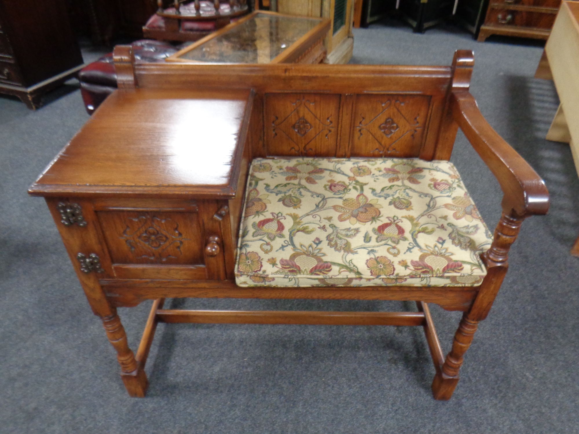 A Chapman's Siesta oak telephone table