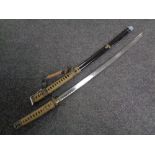 A contemporary Japanese katana in sheath