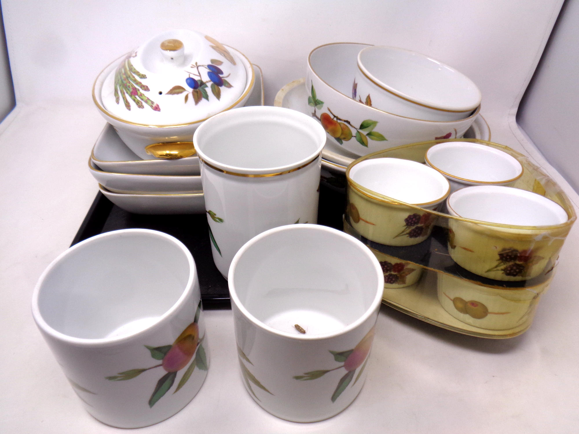 A tray of a collection of Royal Worcester Evesham oven dishes, tureens,