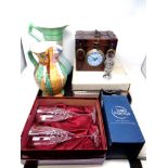 A tray containing assorted collector's plates, pair of boxed Royal Doulton crystal champagne flutes,