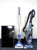 A Shark upright vacuum together with a Home-Tec floor cleaner and an LG 32" LCD TV