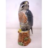 A Beswick Whyte & Mackay Peregrine Falcon decanter containing The Dalmore 12 Year Old Scotch Whisky,