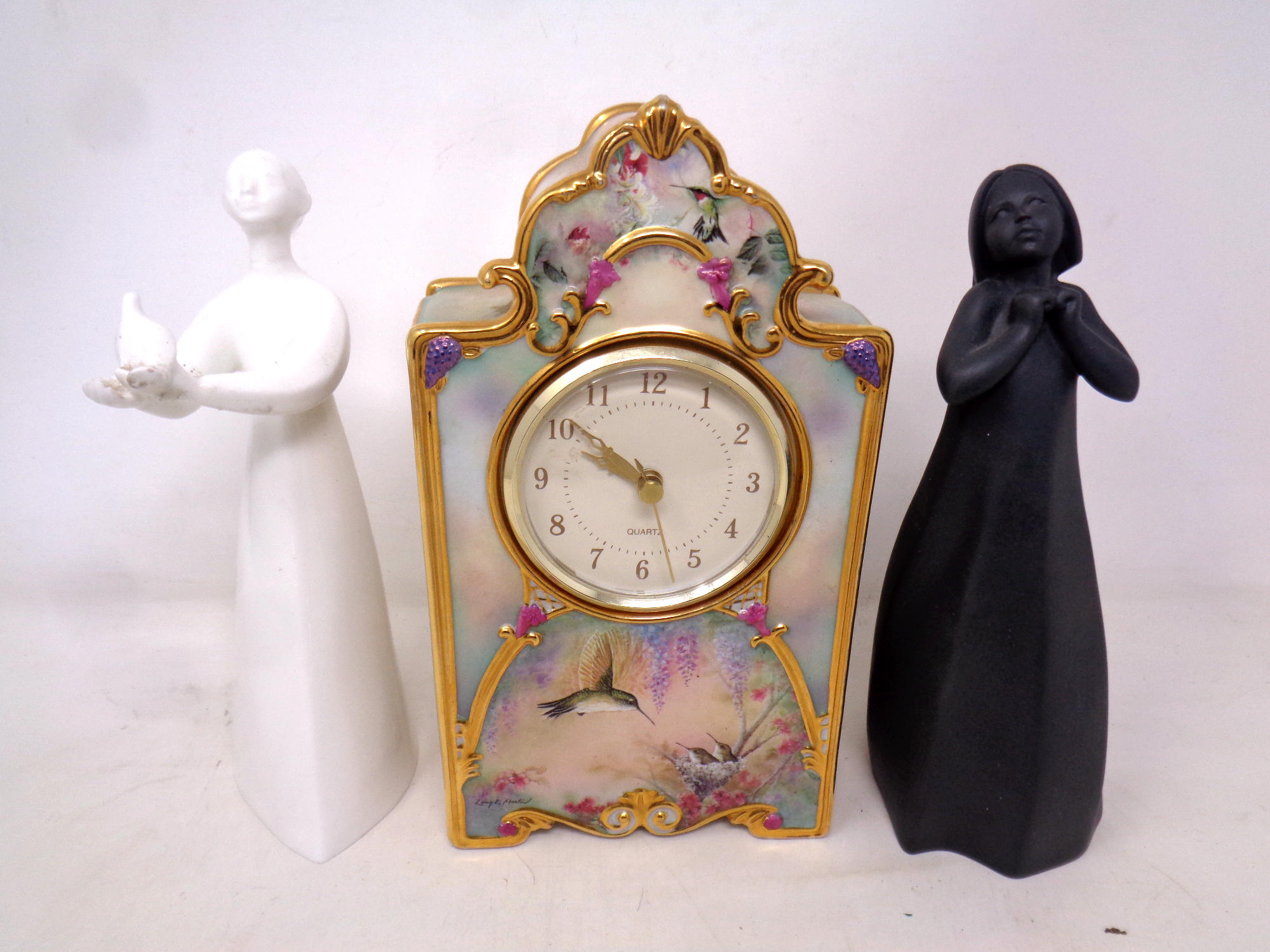 A Bradford Exchange Garden Whispers limited edition china mantel clock together with two Royal
