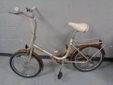 A vintage Phillips Folda folding bike