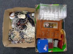 Two boxes containing a large quantity of costume jewelry, jewelry boxes and cabinets.