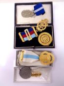 A quantity of Masonic medallions.