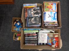 Four boxes containing assorted DVD's, Teenage Mutant Ninja Turtles calendar, books, stamps,