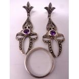 A pair of Marcasite earrings together with a dress ring.