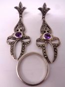 A pair of Marcasite earrings together with a dress ring.