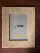 Nineteen Xenos white-washed wooden photo frames, 13 cm x 18 cm, all brand new and still wrapped.