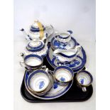 A tray of twenty-two pieces of Booths Real Old Willow tea and dinner china